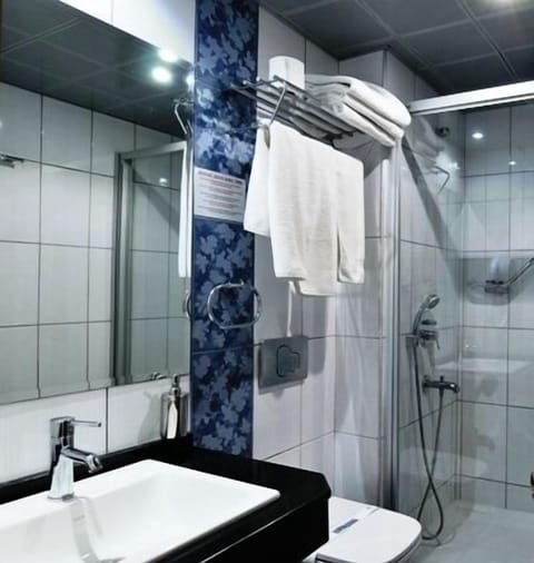 Superior Room, Pool View | Bathroom | Shower, hair dryer, slippers, towels