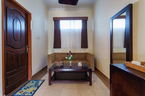 Family Double Room, 2 Double Beds | Living area | LCD TV