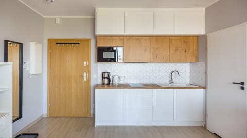 Apartment (51) | Private kitchenette | Fridge, stovetop, electric kettle, cookware/dishes/utensils