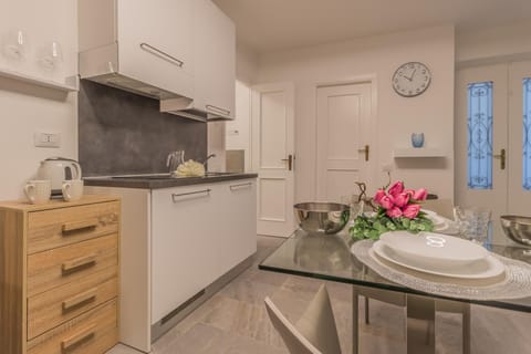 Apartment | Private kitchen | Fridge, stovetop, cookware/dishes/utensils