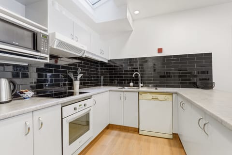 Apartment | Private kitchen | Full-size fridge, microwave, oven, stovetop