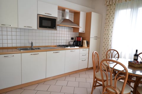 Apartment, 2 Bedrooms, Terrace | Private kitchen | Full-size fridge, microwave, stovetop, dishwasher