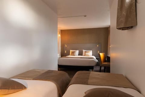 Standard Quadruple Room | Desk, blackout drapes, soundproofing, iron/ironing board