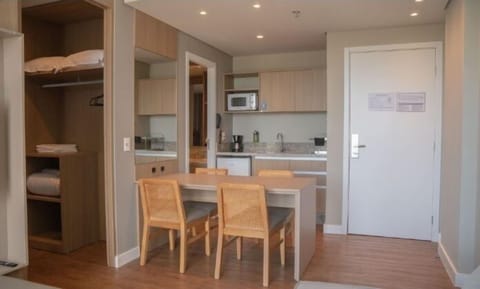 Executive Room | Private kitchen | Mini-fridge, microwave, dining tables