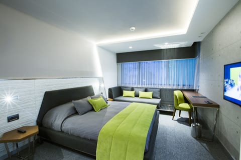 Deluxe Double Room | Living area | 42-inch LED TV with satellite channels, TV