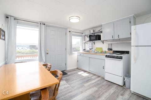 C4 Premium Cabin, 2 Bedrooms, Kitchen, Riverfront, Private Balcony, No Pets | Private kitchen | Microwave, coffee/tea maker, cleaning supplies, paper towels