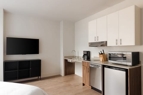 Room, 1 King Bed, Mobility Accessible, Kitchenette | Private kitchen | Full-size fridge, cookware/dishes/utensils