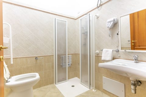 Room | Bathroom | Rainfall showerhead, hair dryer, towels, soap