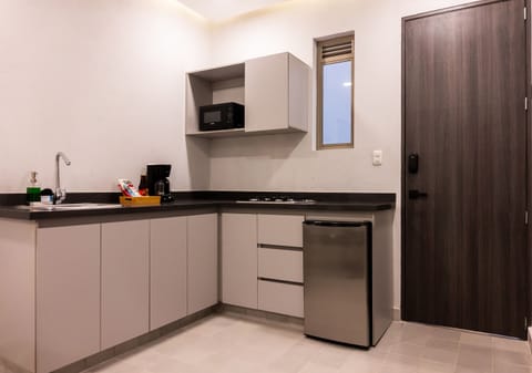 Classic Suite | Private kitchen | Mini-fridge, coffee/tea maker