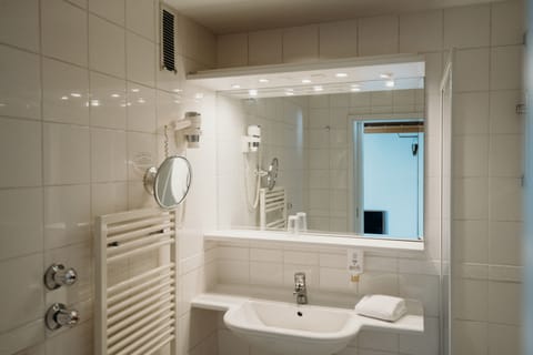 Hair dryer, towels, soap, shampoo