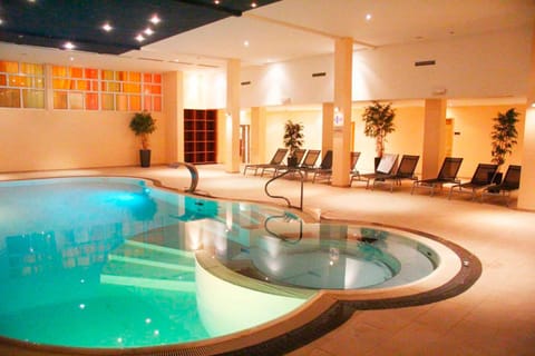 Indoor pool, sun loungers