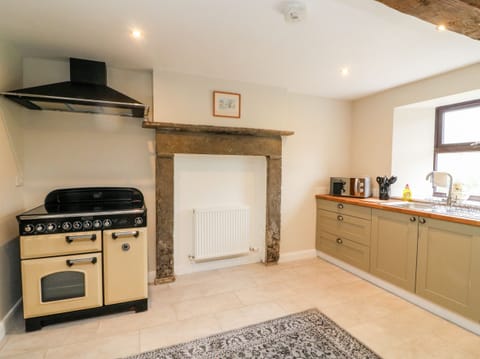 Fridge, electric kettle, toaster, cookware/dishes/utensils