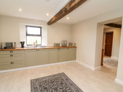 Fridge, electric kettle, toaster, cookware/dishes/utensils