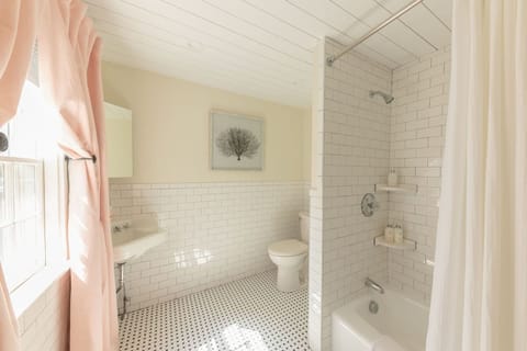 Separate tub and shower, hair dryer, bathrobes, towels