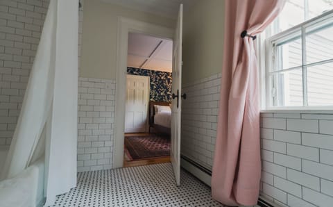 Deluxe Room, 1 Queen Bed | Bathroom | Separate tub and shower, hair dryer, bathrobes, towels