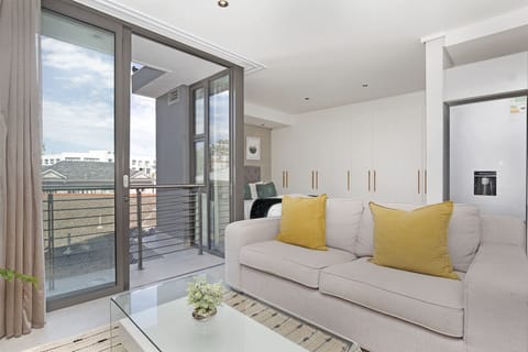 Exclusive Studio | Living area | 38-inch flat-screen TV with cable channels, TV, Netflix