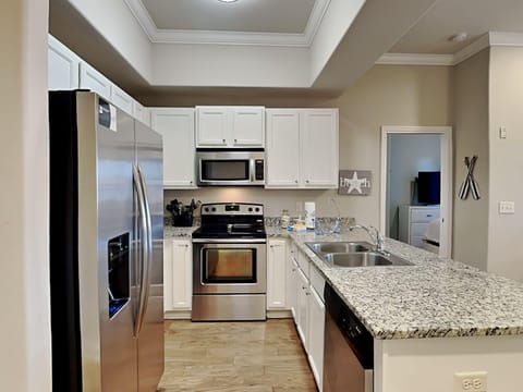 Condo, Multiple Beds, Balcony, Ocean View (#E203 - No Pets Allowed) | Private kitchen | Fridge, microwave, oven, stovetop