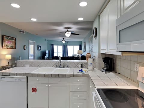 Condo, Multiple Beds, Balcony, Ocean View (#302 - No Pets Allowed) | Private kitchen | Fridge, microwave, oven, stovetop