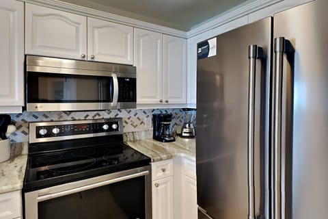 Condo, Multiple Beds, Kitchen, Ocean View (#104 - No Pets Allowed) | Private kitchen | Fridge, microwave, oven, stovetop