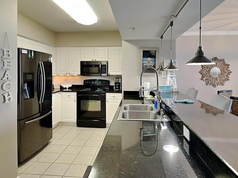 Condo, Multiple Beds, Balcony, Ocean View (#1028 - No Pets Allowed) | Private kitchen | Fridge, microwave, oven, stovetop