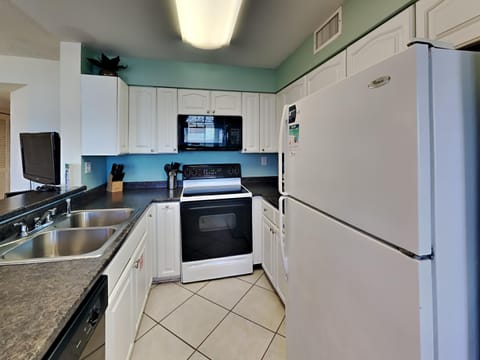 Condo, 1 King Bed with Sofa bed, Balcony, Ocean View (#102 - No Pets Allowed) | Private kitchen | Fridge, microwave, oven, stovetop