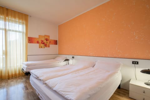 Comfort Triple Room, 1 Bedroom | In-room safe, desk, free cribs/infant beds, free WiFi