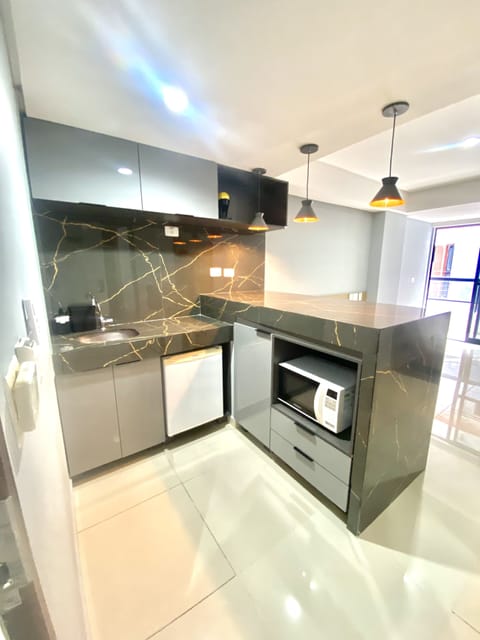 Premium Room | Private kitchen | Microwave, stovetop, coffee/tea maker, toaster