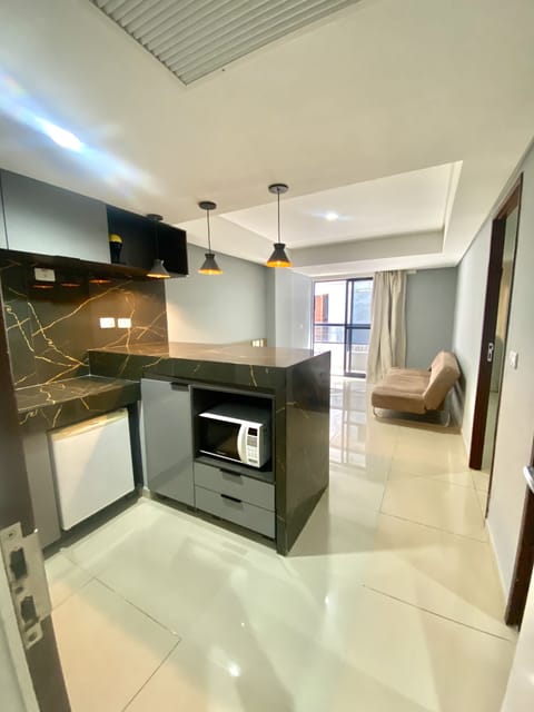 Premium Room | Private kitchen | Microwave, stovetop, coffee/tea maker, toaster