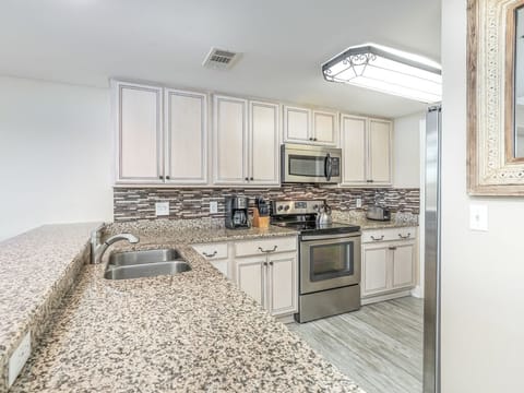 Condo, Multiple Beds, Kitchen, Ocean View (107 - No Pets Allowed) | Private kitchen | Fridge, microwave, oven, stovetop