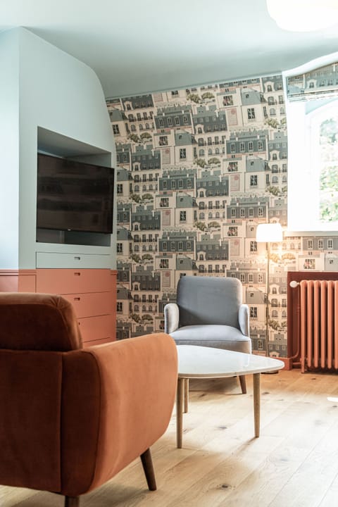 Superior Room | Living area | 40-inch Smart TV with digital channels, TV