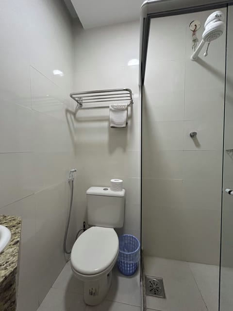 Shower, rainfall showerhead, towels, soap