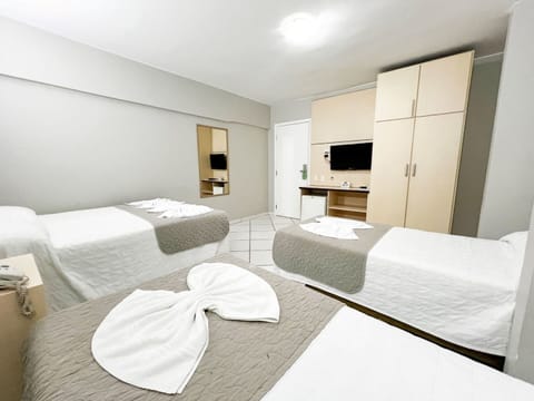 Deluxe Quadruple Room, Multiple Beds | Minibar, laptop workspace, free WiFi, bed sheets