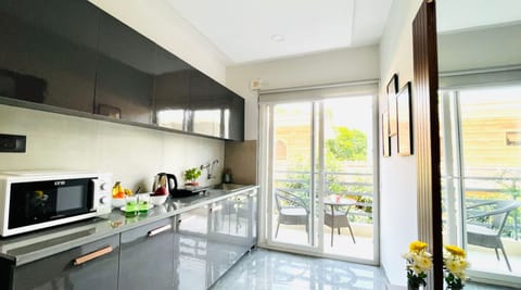 Studio With Balcony | Private kitchen | Fridge, microwave, stovetop, dishwasher