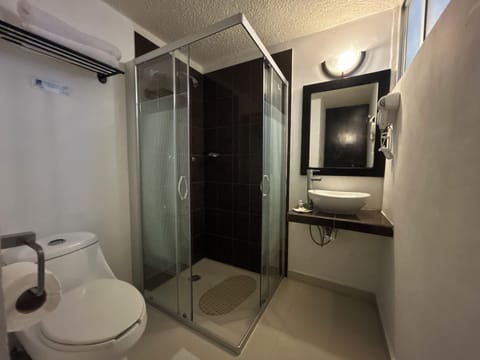 Basic Double Room, 1 Queen Bed | Bathroom | Shower, free toiletries, hair dryer, towels