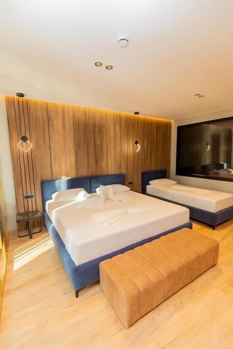 Family Room, Sea View | Minibar, in-room safe, soundproofing, free WiFi