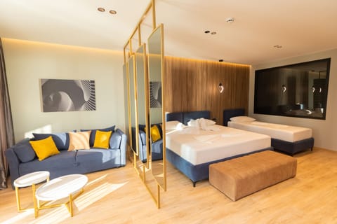 Deluxe Family Room | Minibar, in-room safe, soundproofing, free WiFi