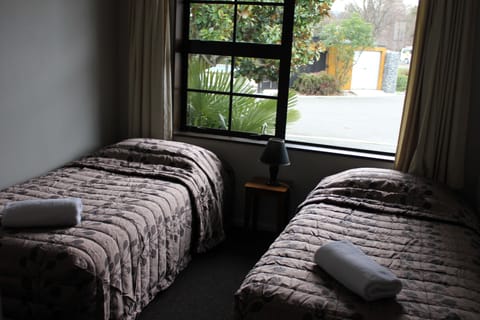 Three Bedroom Unit Apartment | Premium bedding, iron/ironing board, cribs/infant beds, free WiFi