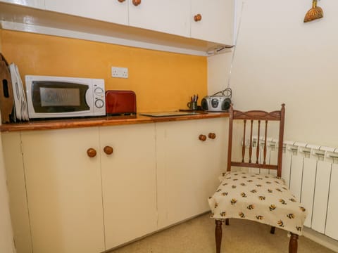 Fridge, electric kettle, toaster, cookware/dishes/utensils