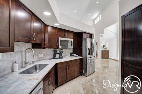 Villa | Private kitchen | Fridge, highchair, cookware/dishes/utensils