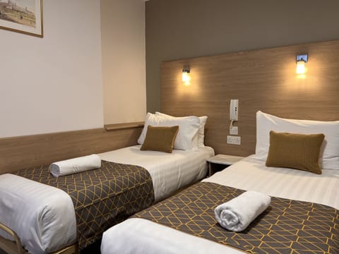 Basic Twin Room, Shared Bathroom | Premium bedding, Select Comfort beds, desk, laptop workspace