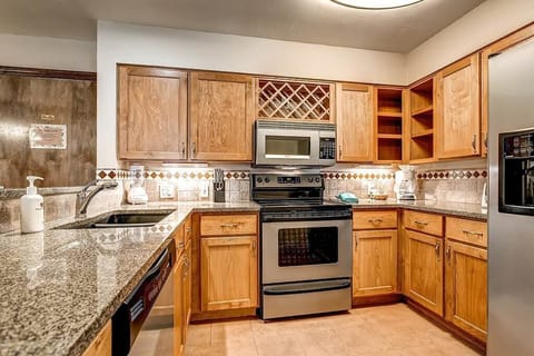 Suite, 2 Bedrooms | Private kitchen | Full-size fridge, microwave, stovetop, dishwasher