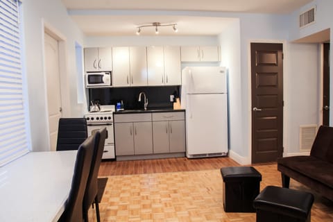 Junior Suite | Private kitchen | Full-size fridge, microwave, stovetop, coffee/tea maker