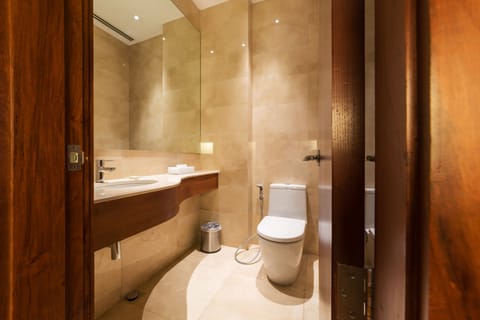 Junior Suite, 1 King Bed | Bathroom | Deep soaking tub, free toiletries, hair dryer, bathrobes