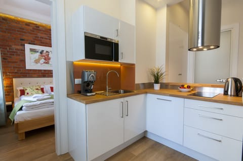 Apartment, 1 Bedroom (Floryda -  4 Helska Street) | Private kitchenette | Fridge, stovetop, espresso maker, coffee/tea maker