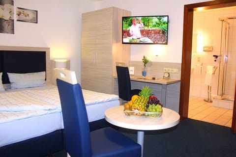 Triple Room | Down comforters, individually furnished, desk, iron/ironing board