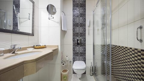 Shower, eco-friendly toiletries, hair dryer, towels