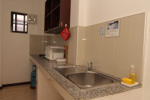 Deluxe Room | Private kitchen | Fridge, microwave, coffee/tea maker