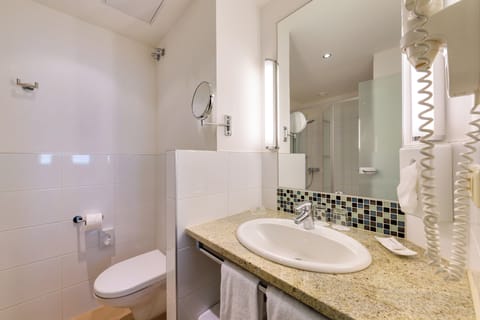 Shower, eco-friendly toiletries, hair dryer, bathrobes