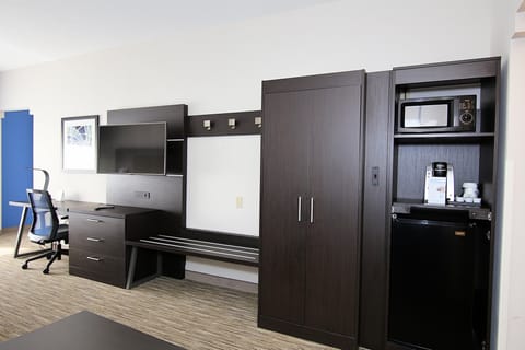 Suite, 1 Bedroom | Desk, blackout drapes, iron/ironing board, rollaway beds