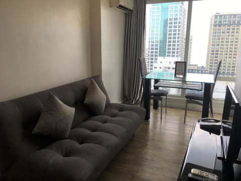 Suite, 1 Bedroom | Living room | Flat-screen TV